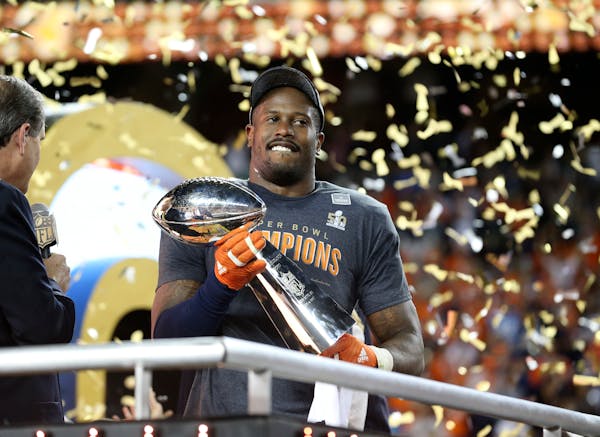 Broncos linebacker Von Miller with the Vince Lombardi Trophy after beating the Carolina Panthers 24-10 in Super Bowl 50 on Sunday.