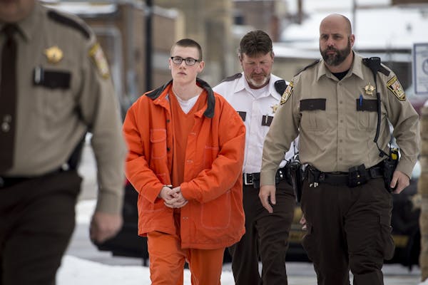 John LaDue was escorted by Waseca County Sheriffs from jail to the county courthouse for a hearing Wednesday afternoon.