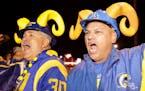 Football fans cheered the return of the Rams to Los Angeles on the site of the old Hollywood Park horse racing track in Inglewood, Calif., on Tuesday.
