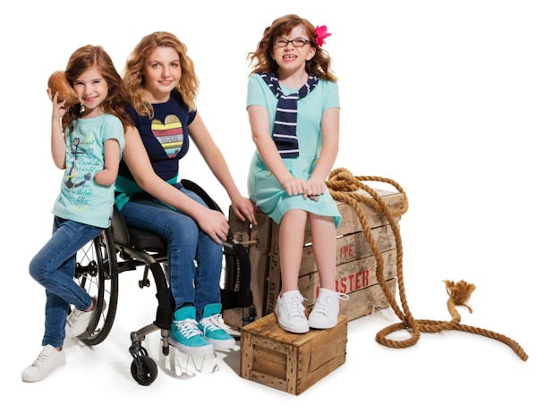 Tommy Hilfiger's new line for disabled kids includes classic polo shirts, button-ups and khakis, but with adaptations to get in and out of clothing in