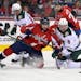 Washington Capitals center Mike Richards (10) battles for the puck against Minnesota Wild center Mikko Koivu (9), of Finland, during the first period 