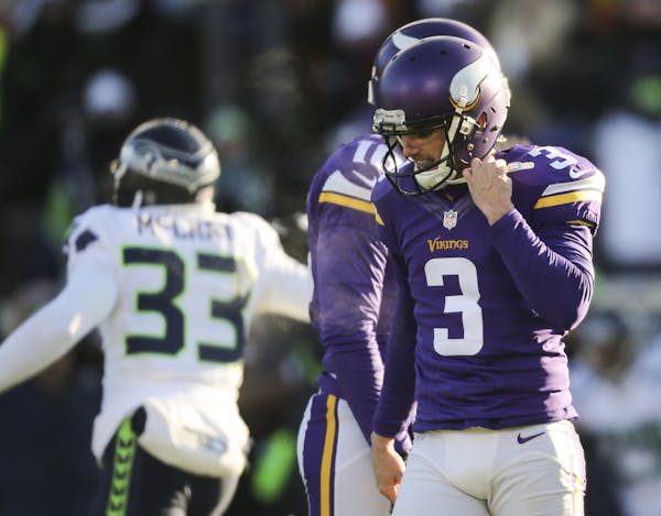 Vikings kicker Blair Walsh walked away after his chance for a game-winning 27 yard field goal sailed wide left at the end of the fourth quarter and th