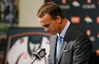 Denver Broncos quarterback Peyton Manning struggles to talk during his retirement announcement at team headquarters Monday, March 7, 2016, in Englewoo