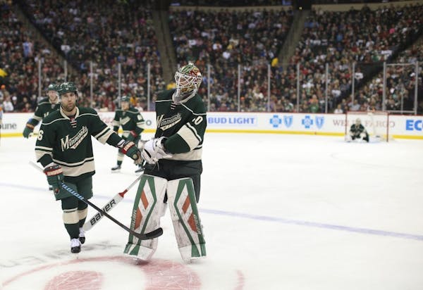 Wild goalie Devan Dubnyk (40) staked off the ice after being replaced when he gave up a third goal to St. Louis in the second period Sunday night.