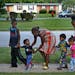 Destiny’s world: “I don’t let them go outside anymore,” said Darlene Evans, below, as she took a walk with her five youngest children in Fergu