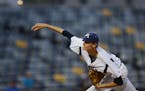 Mahtomedi's Sean Hjelle pitched in the bottom of the fourth inning Friday evening in St. Paul. ] RACHEL WOOLF ï rachel.woolf@startribune.com Armstron