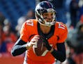 FILe - In this Jan. 3, 2016, file photo, Denver Broncos quarterback Brock Osweiler warms up during the first half in an NFL football game against the 