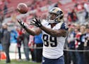 FILE - In this Jan. 3, 2016, file photo, St. Louis Rams tight end Jared Cook warms up before an NFL football game against the San Francisco 49ers in S