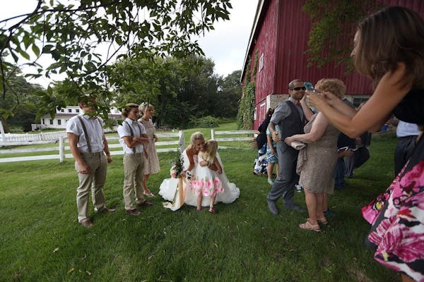 Newlyweds Savannah and Jeremy Eckert posed for photographs following a 2015 wedding ceremony at a Cottage Grove barn.