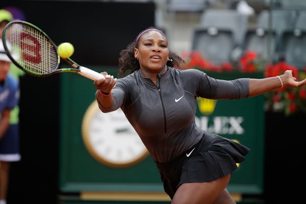 Serena Williams of the US returns the ball to Christina McHale of the US during their match at the Italian Open tennis tournament, in Rome, Thursday, 