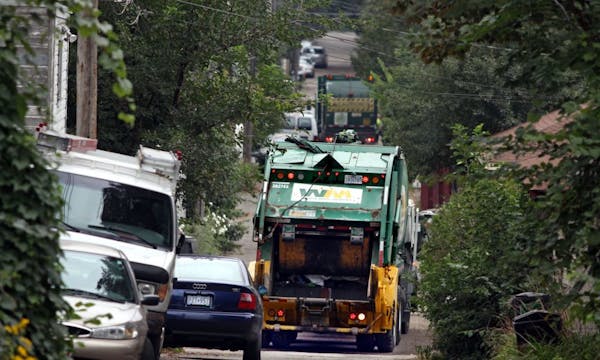 Trash haulers in St. Paul's Mac-Groveland neighborhood in 2009.