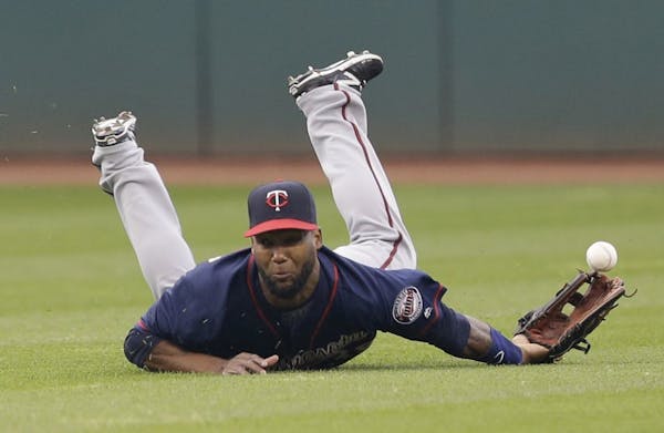 Minnesota Twins' Danny Santana can't get to a double hit by Cleveland Indians' Jose Ramirez during the second inning of a baseball game Friday, May 13