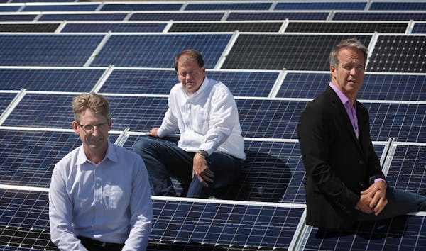 Jeffrey Hohn, left, is succeeding Ten K Solar co-founder Joel Cannon, center, as the Bloomington company’s CEO. Cannon, a self-described “early st