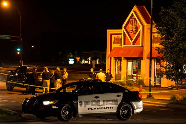 Police responded to an officer-involved shooting at an Arby's in Plymouth on Thursday, July 23, 2015.