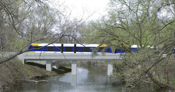 A rendering of the Southwest light rail train passing through the Kenilworth Lagoon. The train line aiming to link Eden Prairie to Minneapolis is a st