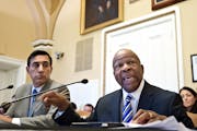 An upgrade of the FOIA had rare bipartisan support, including from Reps. Darrell Issa, R-Calif., left, and Elijah Cummings, D-Md.