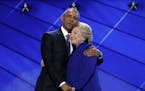 President Obama hugged Hillary Clinton after his speech Wednesday at the Democratic National Convention in Philadelphia.
