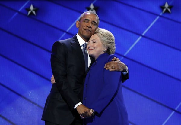 President Obama hugged Hillary Clinton after his speech Wednesday at the Democratic National Convention in Philadelphia.