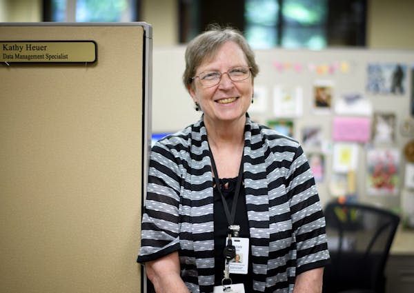 Kathy Heuer is 66 and working for at least 3 more years past the usual retirement age. She works at the Metropolitan Area Agency on Aging in Maplewood