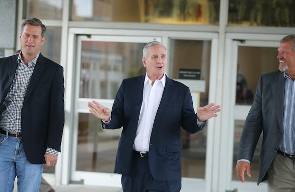 Speaker of the House Kurt Daudt, left, Governor Mark Dayton, center, and Senator Tom Bakk, shown in August.