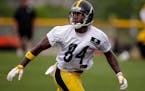 Pittsburgh Steelers wide receiver Antonio Brown (84) runs a pass pattern during a practice at the NFL football team's training camp in Latrobe, Pa., o