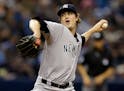 FILE - In a Friday, May 27, 2016 file photo, New York Yankees relief pitcher Andrew Miller delivers to the Tampa Bay Rays during the eighth inning of 