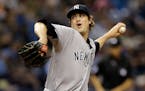 FILE - In a Friday, May 27, 2016 file photo, New York Yankees relief pitcher Andrew Miller delivers to the Tampa Bay Rays during the eighth inning of 