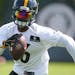 FILE - In this May 24, 2016, file photo, Pittsburgh Steelers running back Le'Veon Bell (26) carries the ball during NFL football practice in Pittsburg
