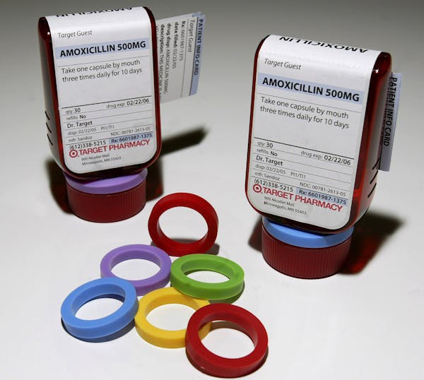 Target’s iconic red medication bottles won national praise when they were introduced a decade ago. They included plastic rings that color coded the 