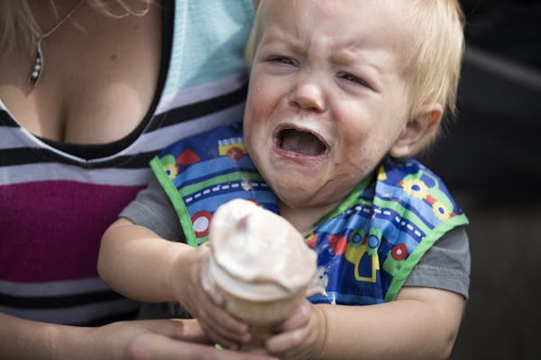 Fourteen-month-old Levi Porter of Oakdale gets a bit of brain freeze after enjoying soft serve from the Dairy Barn.
