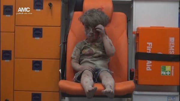 Watch: Haunting images of boy rescued in Syria