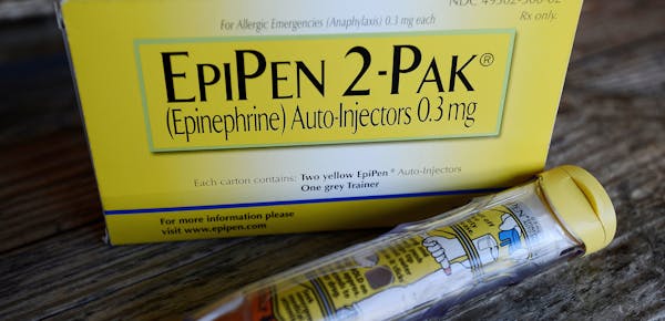 FILE - This Oct. 10, 2013, file photo, shows an EpiPen epinephrine auto-injector, a Mylan product, in Hendersonville, Texas.