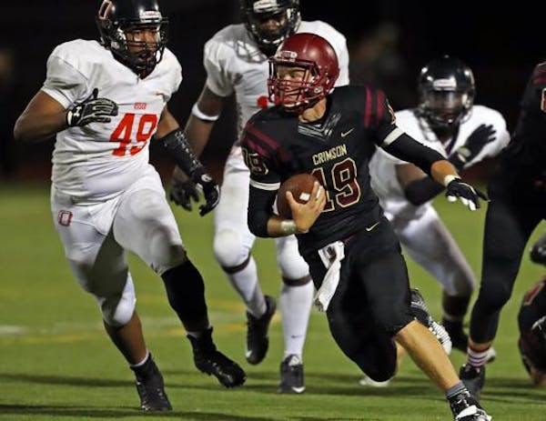 Maple Grove quarterback Brad Davison escaped for big yardage and a touchdown that sealed the game in the second half against Osseo.