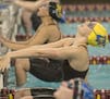 Wayzata'ss Carly Quast, center, prepared for the start of the 100-yard backstroke in the Class 2A meet preliminaries last year. She won the event.