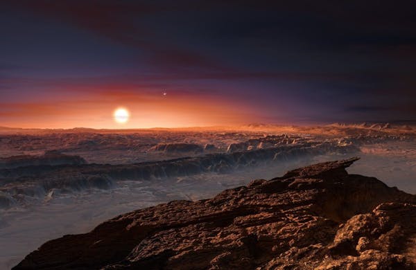 This artist rendering provided by the European Southern Observatory shows a view of the surface of the planet Proxima b orbiting the red dwarf star Pr