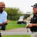 Two-time defending champion Kenny Perry (right, with ESPN basketball analyst Bruce Bowen) is trying to play more with his grandkids as well as play go