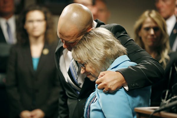 Patty Wetterling was consoled by son Trevor during a news conference after Danny Heinrich admitted killing her son Jacob. Trevor was with Jacob on the
