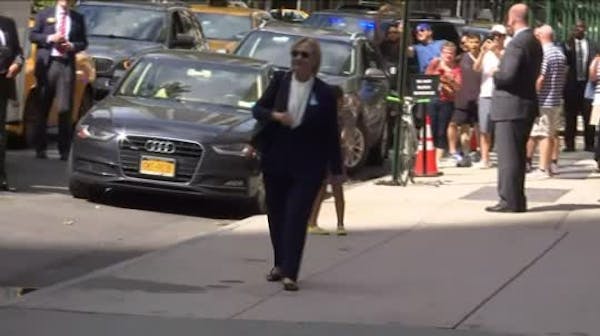 Clinton stumbles leaving 9/11 event