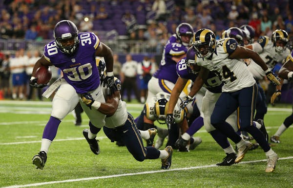 Vikings running back C.J. Ham (30), the Duluth native and Augustana graduate, was one of 10 players signed onto the Vikings practice squad.