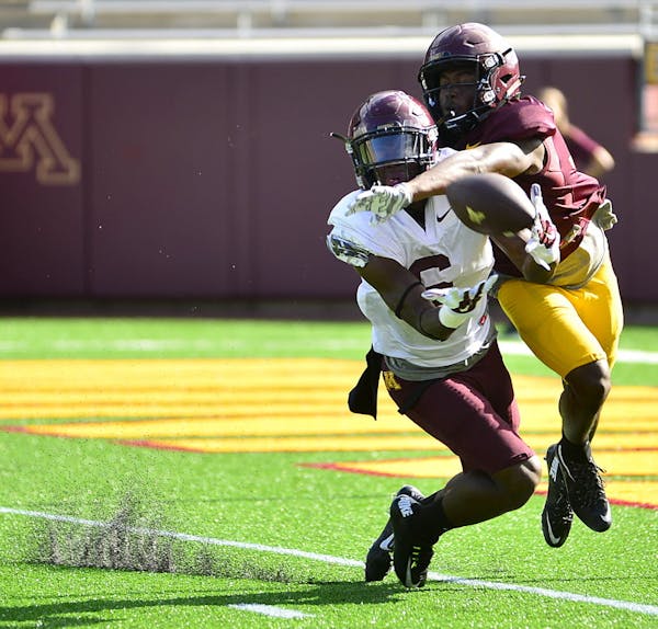 Tyler Johnson catches a pass during practice for the Gophers.