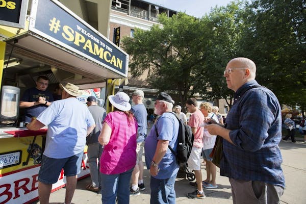 Star Tribune food critic Rick Nelson stands in line for Spam curds.