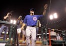 Chicago Cubs starting pitcher Kyle Hendricks waves as he leaves the field following a baseball game against the St. Louis Cardinals, Monday, Sept. 12,