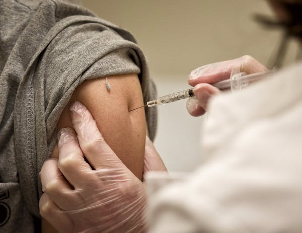 A nurse practitioner at a Target clinic in Roseville administered a flu shot to a 15-year-old boy.