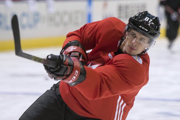 Team Canada’s Sidney Crosby took a shot on net during a training session ahead of the World Cup of Hockey in Toronto on Friday.