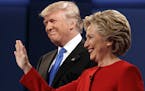 Republican presidential candidate Donald Trump, left, stands with Democratic presidential candidate Hillary Clinton at the first presidential debate a