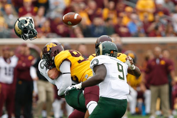 Colorado State quarterback Collin Hill lost his helmet and the football after being tackled by Gophers defensive lineman Tai'yon Devers on Saturday.