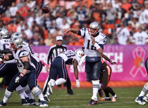 New England Patriots quarterback Tom Brady (12) passes against the Cleveland Browns in the second half of an NFL football game Sunday, Oct. 9, 2016, i