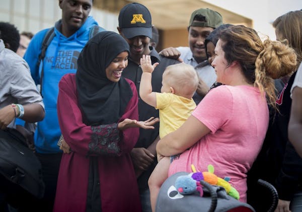 Halima Aden gave some attention to Jayse Waisanen, who kept touching her out of curiosity as his mother, Daynelle Hoff, held him Tuesday during a unit