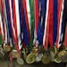 Doug Bakkene of Worthington says "These running awards hang with honor in our unfinished basement just above the deep freezer. Thirty-three years a ru