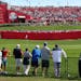 Fans packed the stands and filled in along the fringes for the first tee of the final day of the 2016 Ryder Cup.